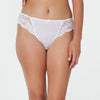 Model wears Body Lace High Cut Brief in WHITE. On body front view