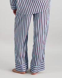 Model wears Cabana Stripe Long Pj Pant in COOL BLUE. On body back view