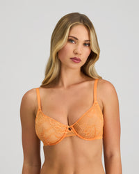Model wears My Fit Underlayer Underwire Bra in TANGERINE. On body front view
