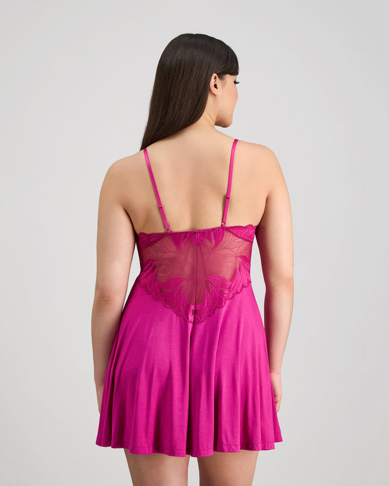 Model wears Siesta Chemise in FANTASY FUCHSIA. On body back view