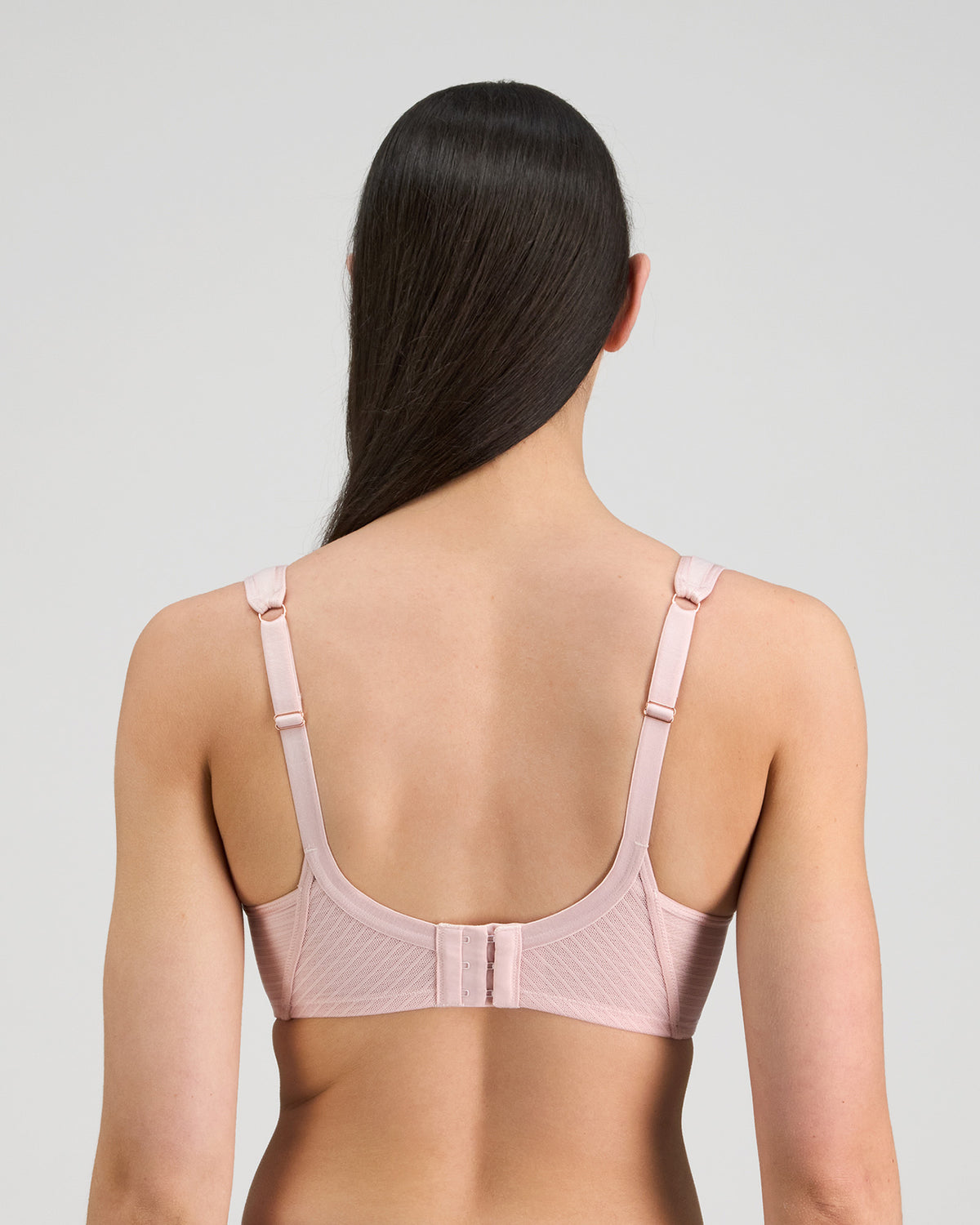 Model wears Perfect Lines Contour Bra in PALE LILAC. On body back view