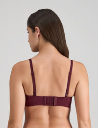 Model wears Comfit Collection Wire Free Bra in FIG. On body back view