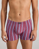 Model wears Cotton Stretch Mens Trunk in TIBETAN RED STRIPE. On body front view
