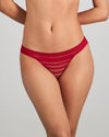 Model wears Morning Lola Thong in JESTER RED. On body front view