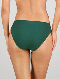 Model wears Embrace Bikini in RAIN FOREST. On body back view