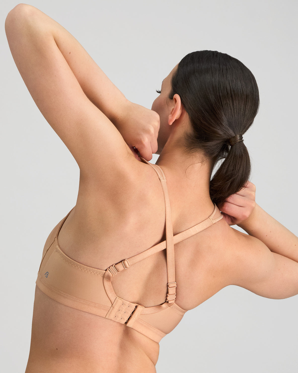 Stamina Wire Free Bra in LATTE. Flat lay back view