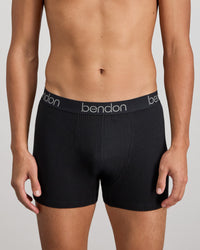 Model wears Cotton Texture Mens Trunk in BLACK. On body front view