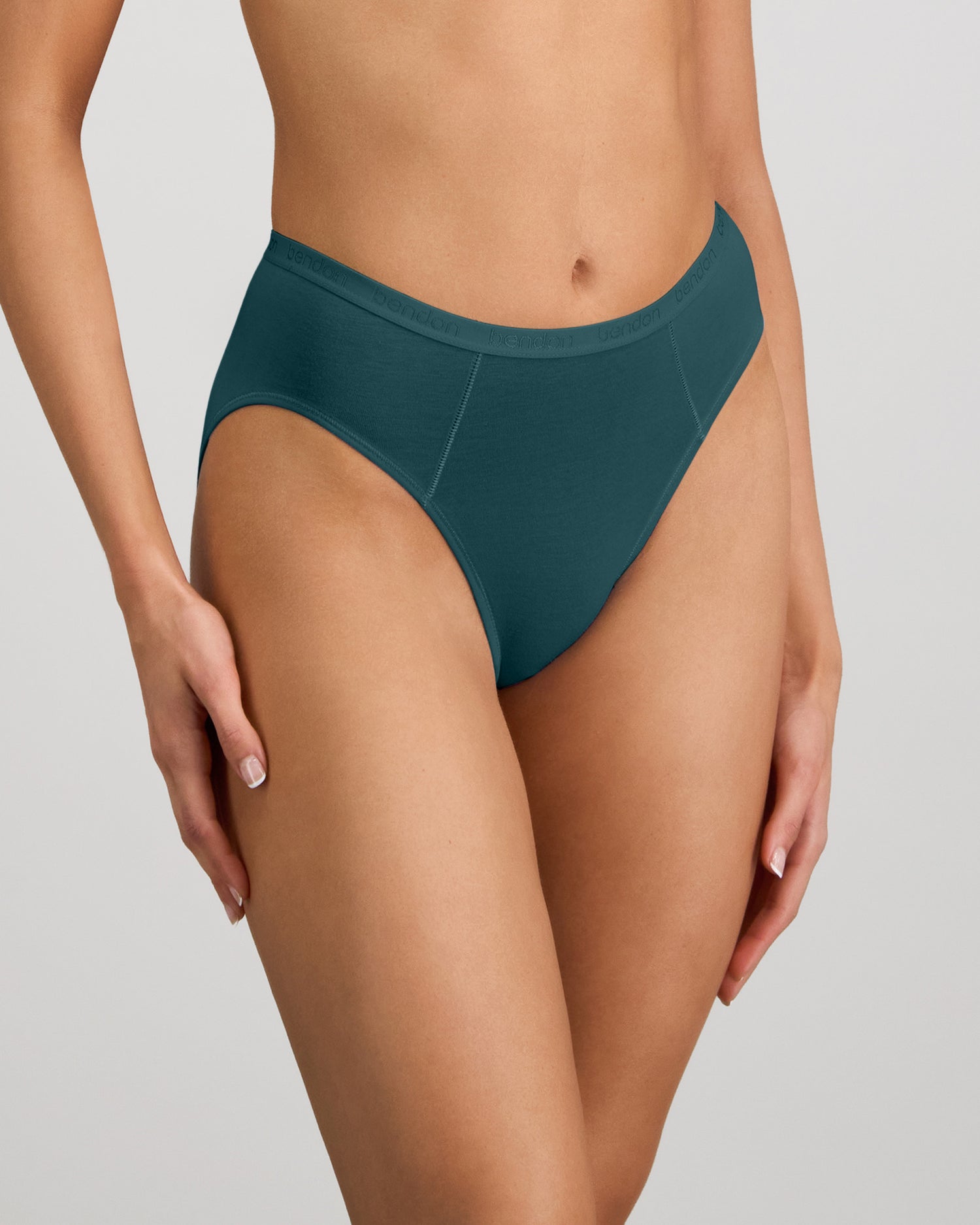 Model wears Body Cotton Bikini in MEDITERRANEA. On body side view