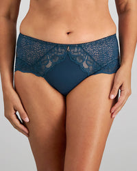 Model wears Midnight Express Full Brief in REFLECTING POND. On body front view