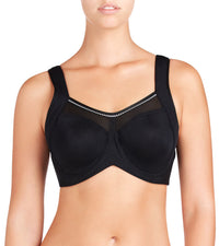 Model wears Bendon Sport Underwire Bra in BLACK/SILVER. On body front view