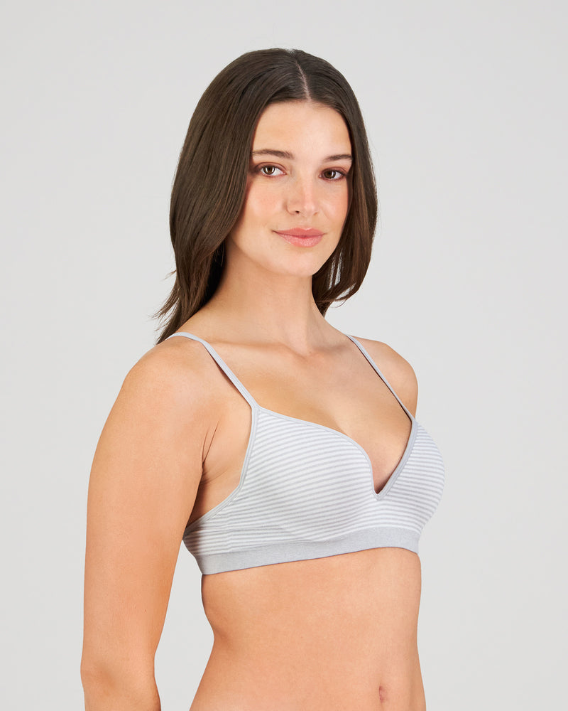 Model wears Simply Seamless Contour Bra in GREY MARL/WHITE STRIPE. On body side view