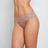 Model wears Lace Thong in MOCHA. On body front view