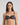 Model wears Adaline Contour Bra in BLACK FLORAL PRINT. On body front view