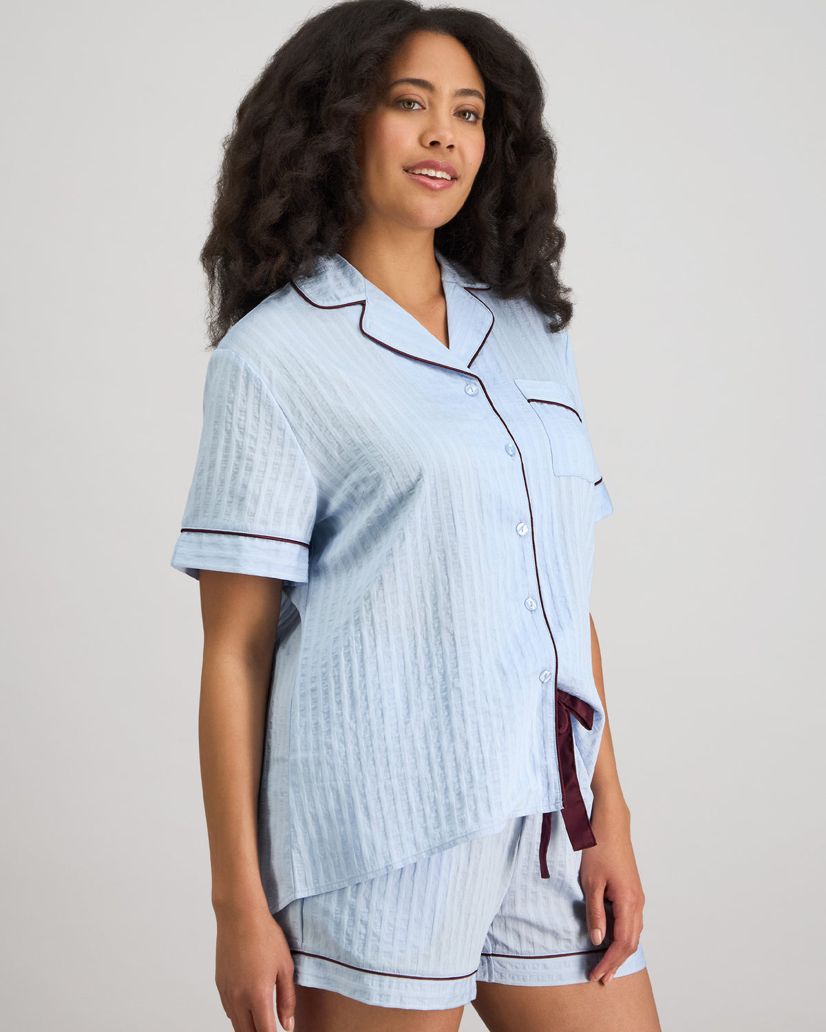 Model wears Whisper Weave Short Pj Set in SKYWAY. On body side view