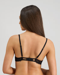 Model wears Lace Impact Contour Bra in BLACK. On body back view