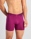 Model wears Bamboo Mens Trunk in MAGENTA PURPLE. On body front view
