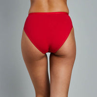 Model wears Body Cotton High Cut Brief Twin Pack in SALSA/DARK SAPPHIRE. On body back view