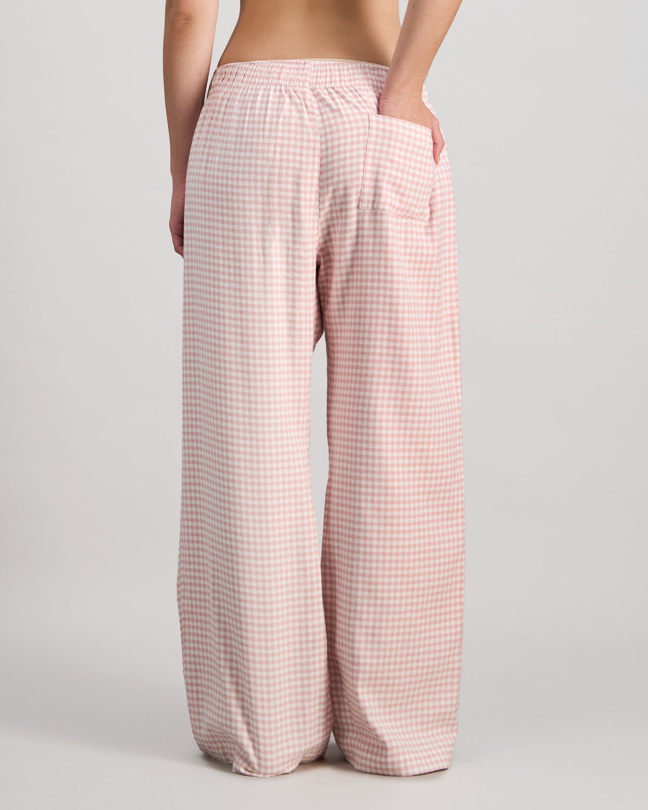 Model wears Cosy Flannel Long PJ Pant in ROSE MINI GINGHAM. On body back view