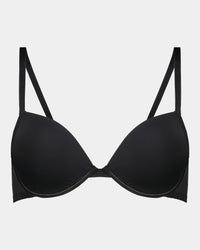 Model wears Body Basics Contour Bra in BLACK. On body front view