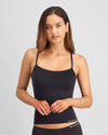 Model wears Simply Seamless Camisole in BLACK. On body front view