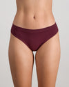 Model wears Seamless Soft Thong in FIG. On body front view