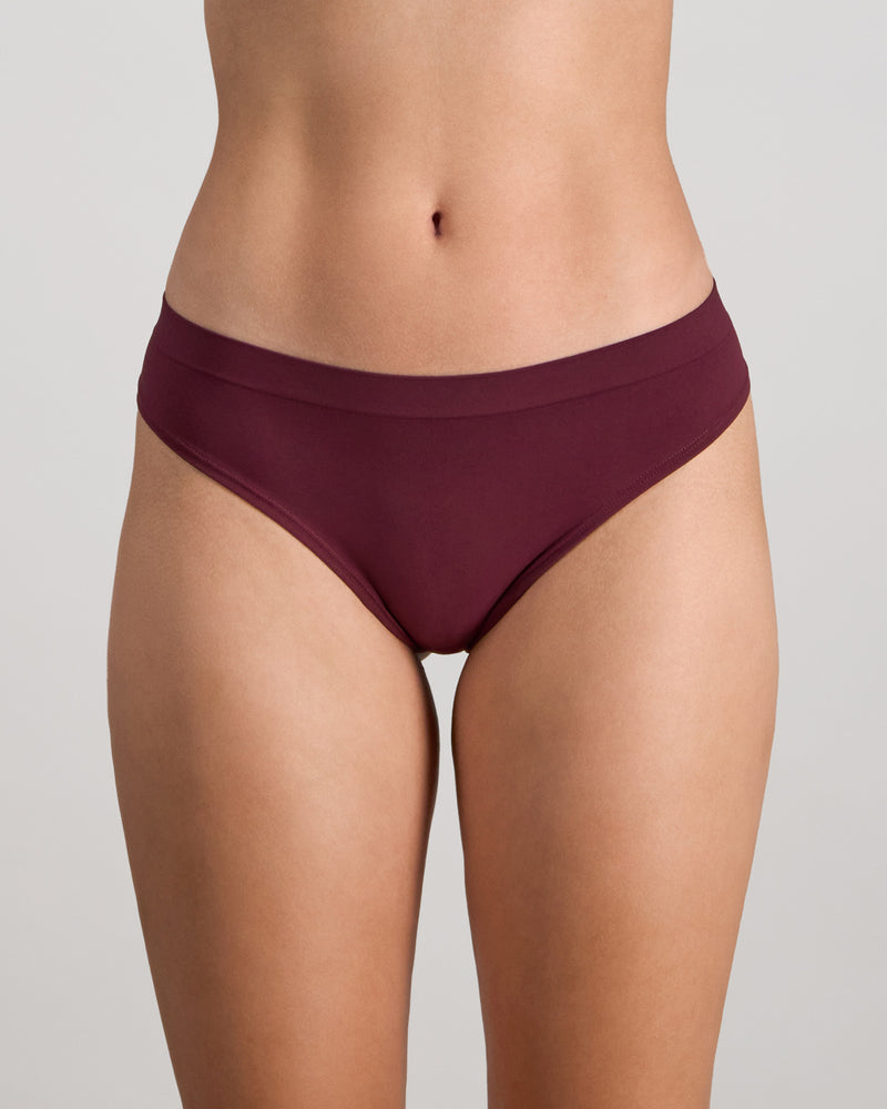 Model wears Seamless Soft Thong in FIG. On body front view
