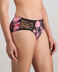 Model wears Wild Violet Full Brief in TANGLED GARDEN PRINT. On body side view