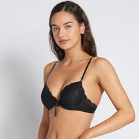 Model wears Alessandra Push Up Bra in BLACK. On body side view