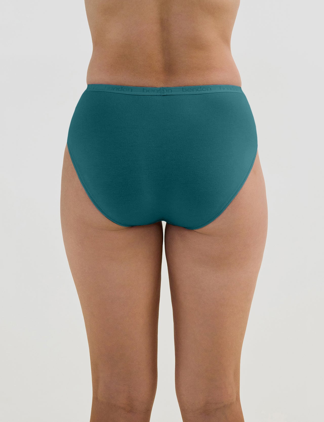 Model wears Body Cotton High Cut Brief in RAIN FOREST. On body back view