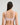Model wears Classic Underwire Underwire Bra in PALE LILAC. On body back view