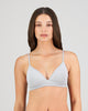 Model wears Simply Seamless Wire Free Bra in GREY MARL/WHITE STRIPE. On body front view