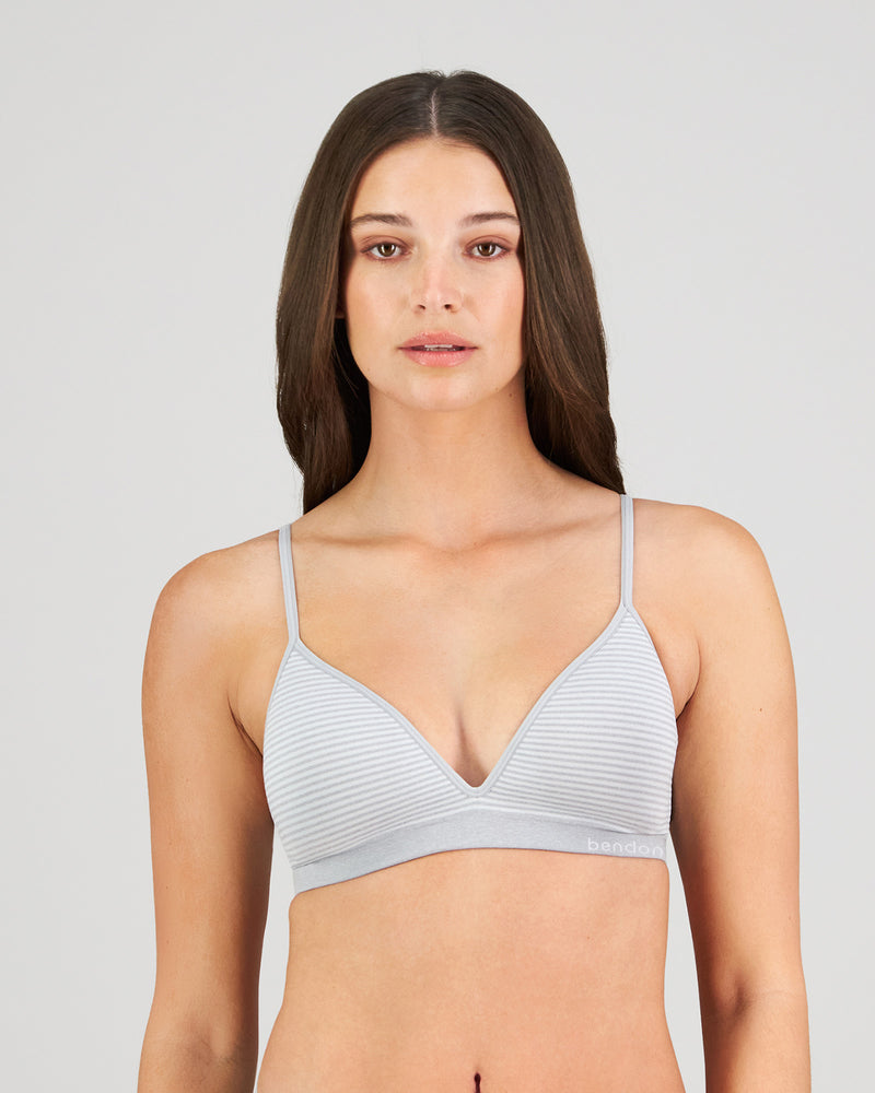 Model wears Simply Seamless Wire Free Bra in GREY MARL/WHITE STRIPE. On body front view