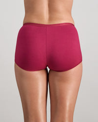Model wears Body Cotton Full Brief in BEAUJOLAIS. On body back view
