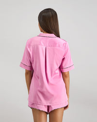 Model wears Holly Short PJ Set in FUCHSIA PINK. On body back view