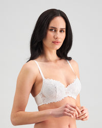 Model wears Alice Contour Bra in WHITE. On body side view