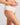 Model wears Alice Midi in WHITE. On body side view