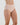 Model wears Seamless Soft Full Brief in LATTE. On body side view