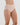 Model wears Seamless Soft Full Brief in LATTE. On body side view