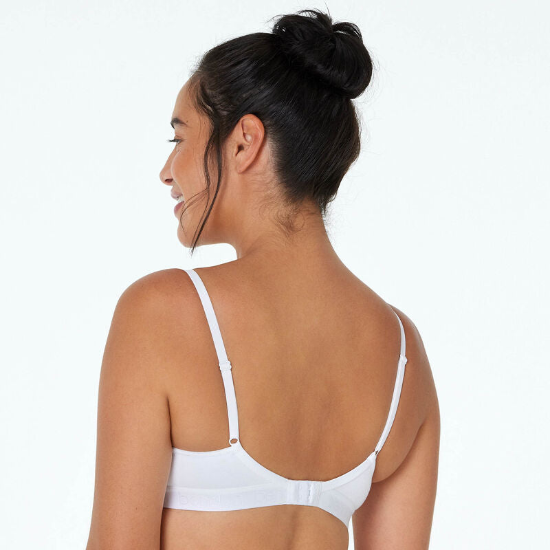 Model wears Body Cotton Contour Bra in WHITE. On body back view