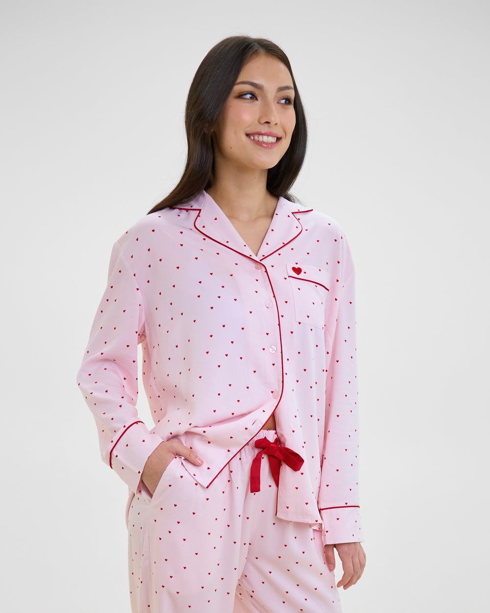 Model wears Hearts In Cabana Long Sleeve Pj Top in MINI HEART PRINT. On body side view