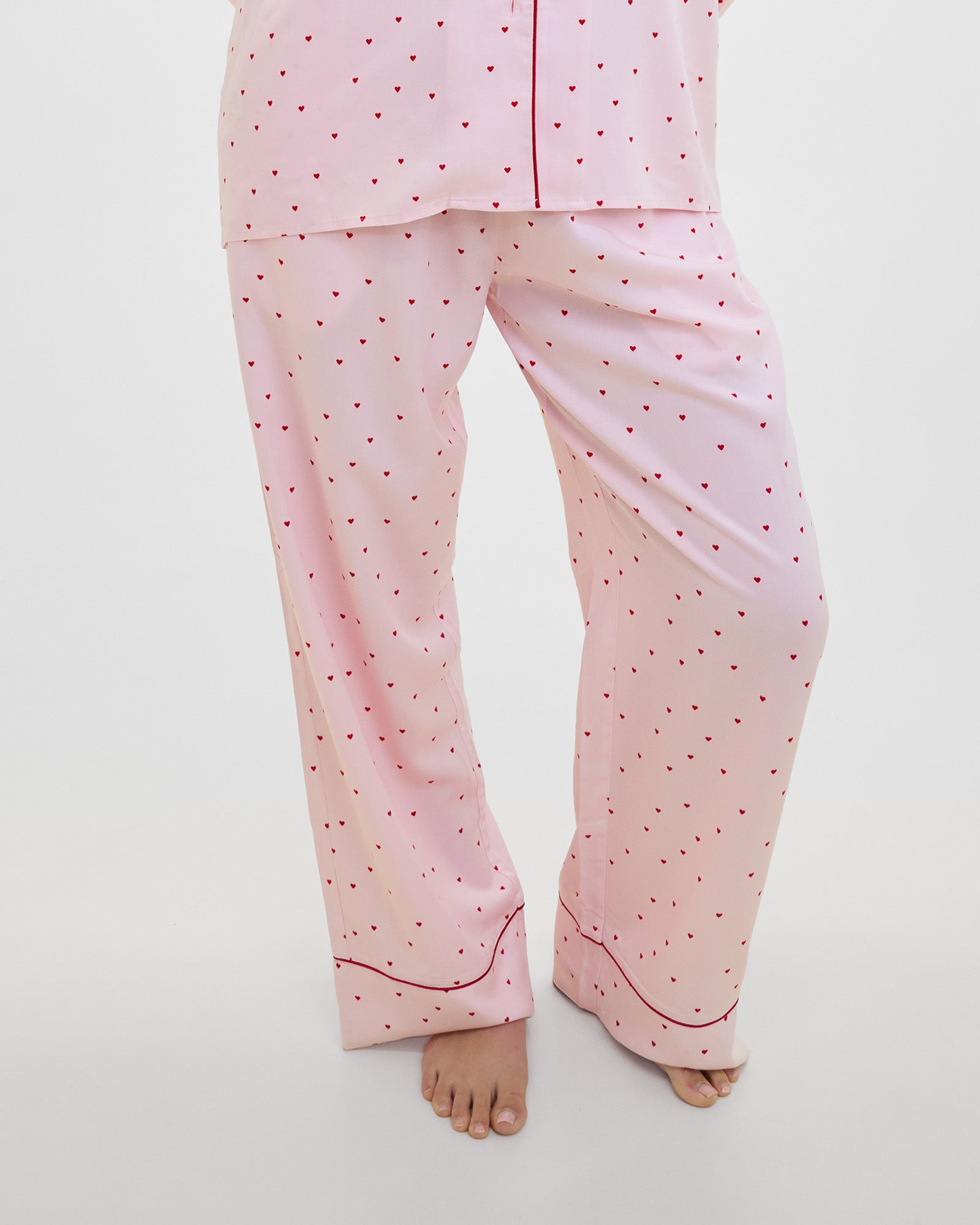 Model wears Hearts In Cabana Long Pj Pant in MINI HEART PRINT. On body side view