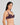 Model wears Damask Contour Bra in PLUM PERFECT. On body side view