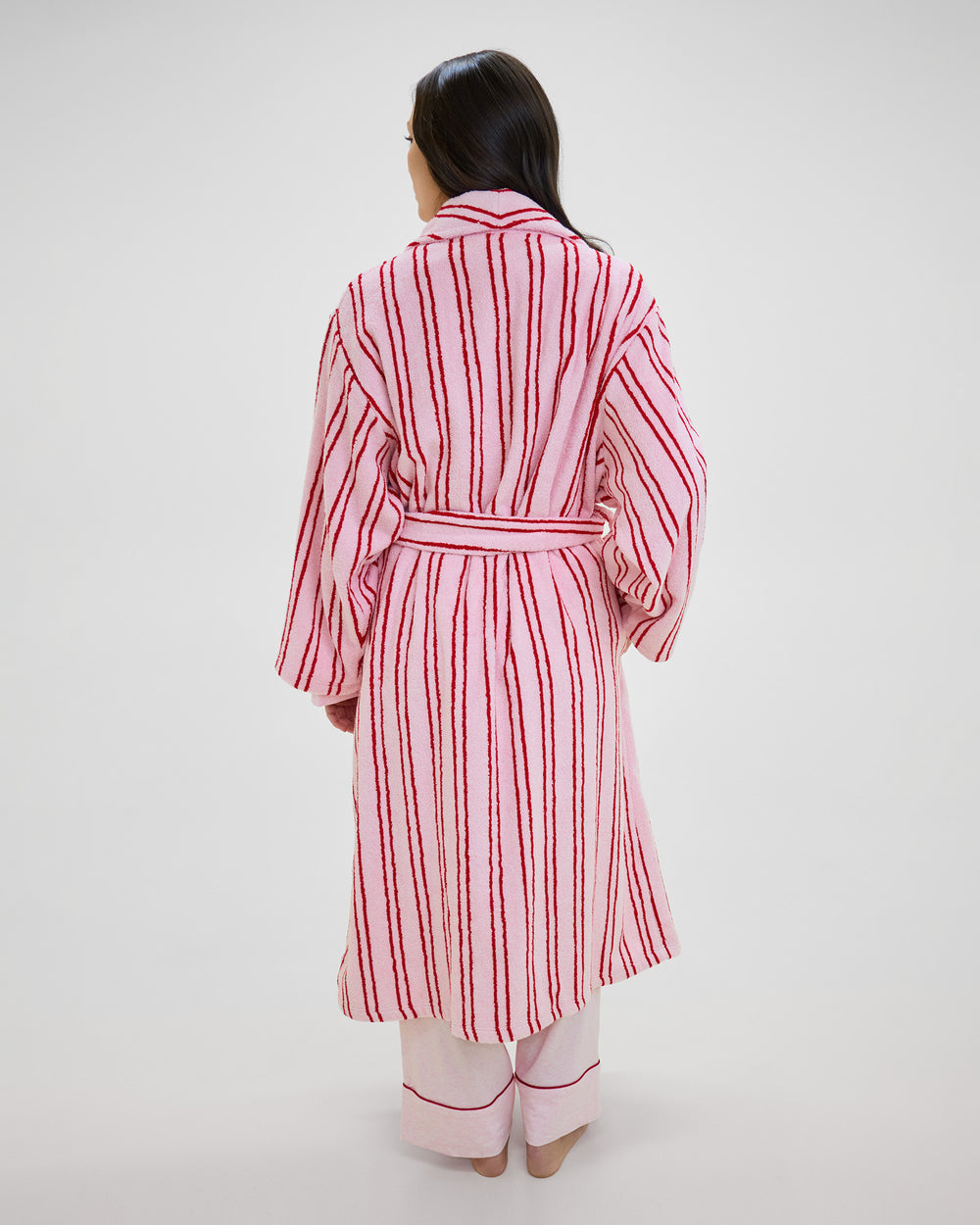 Model wears Riviera Robe in PALE LILAC/SALSA RED. On body back view