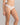 Model wears Sofia Bikini in BRIGHT WHITE. On body side view
