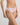 Model wears Embrace Bikini in FESTIVAL BLOOM. On body side view