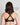 Model wears Bendon Breathe High Impact Sports Bra in BLACK. On body side view