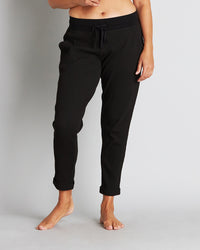 Model wears Mihika Sleeping Jogger in BLACK. On body front view