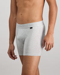Model wears Bamboo Mens Trunk in GREY MARLE. On body side view
