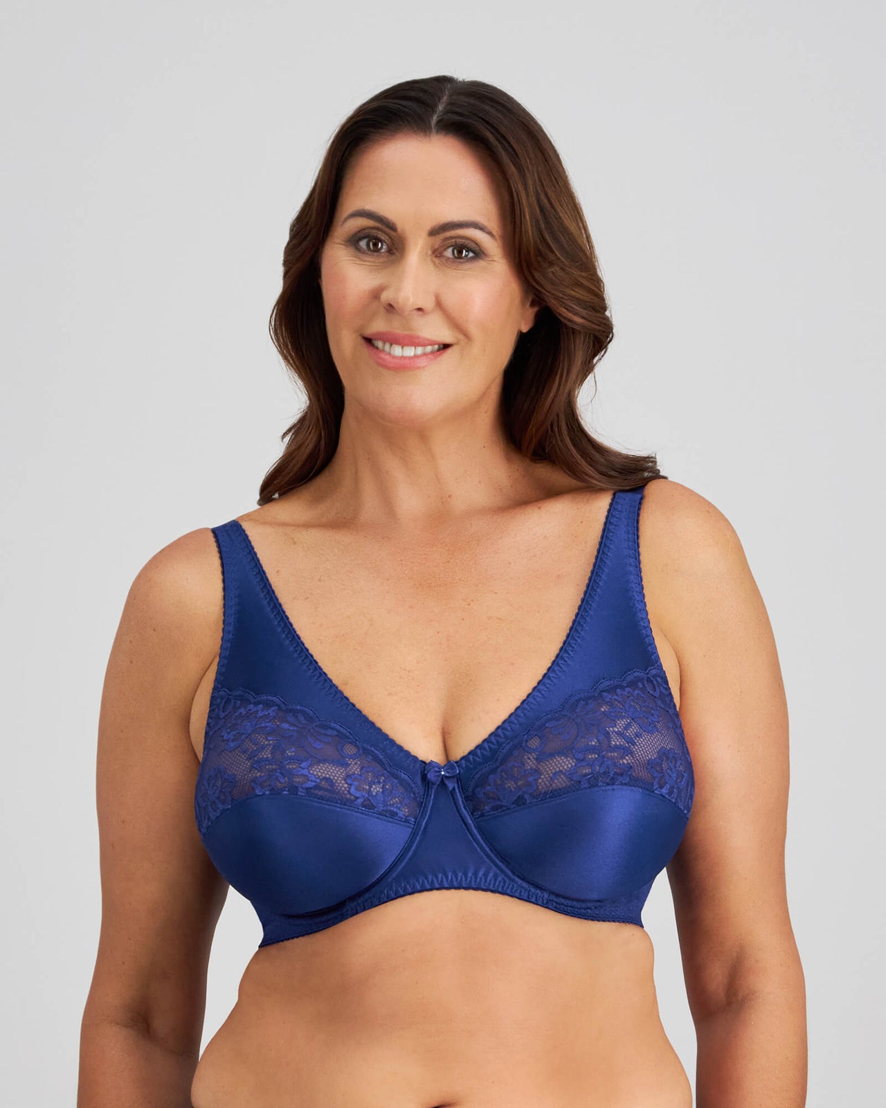 Model wears Classic Underwire Underwire Bra in Medieval Blue. On body front view