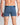 Model wears Bamboo Mens Trunk in BLUE WING TEAL. On body back view